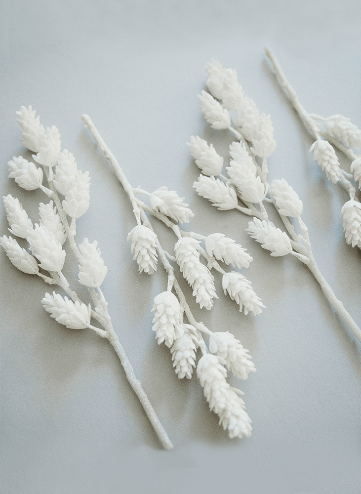 White sparkly artificial twigs